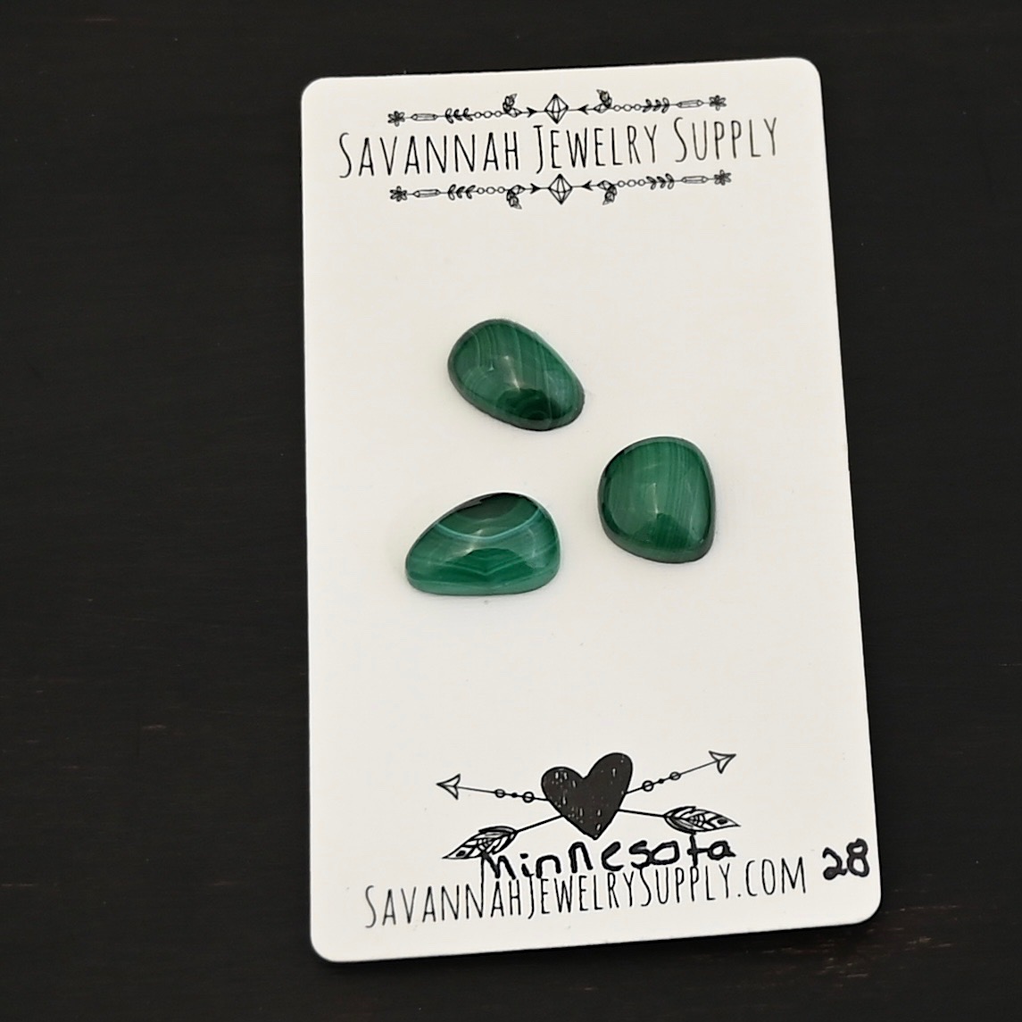 Minnesota Malachite Cabochon Parcel shown on business card