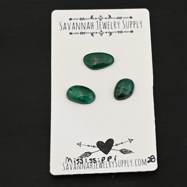 Mississippi Malachite Cabochon Parcel shown on business card