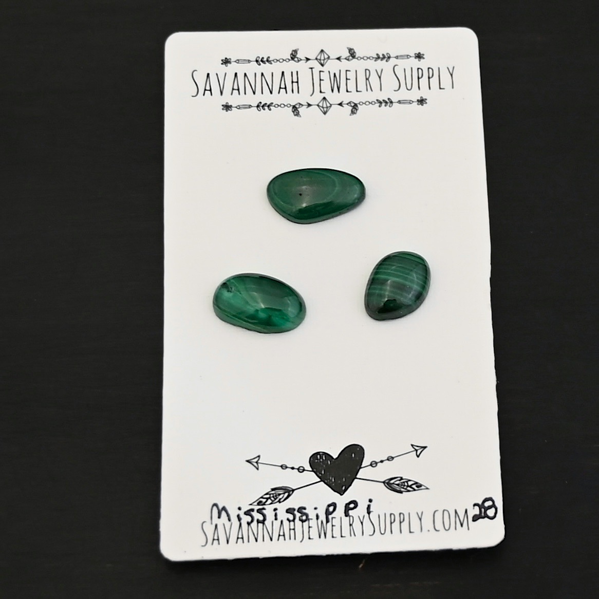 Mississippi Malachite Cabochon Parcel Mississippi Malachite Cabochon Parcel shown on business card