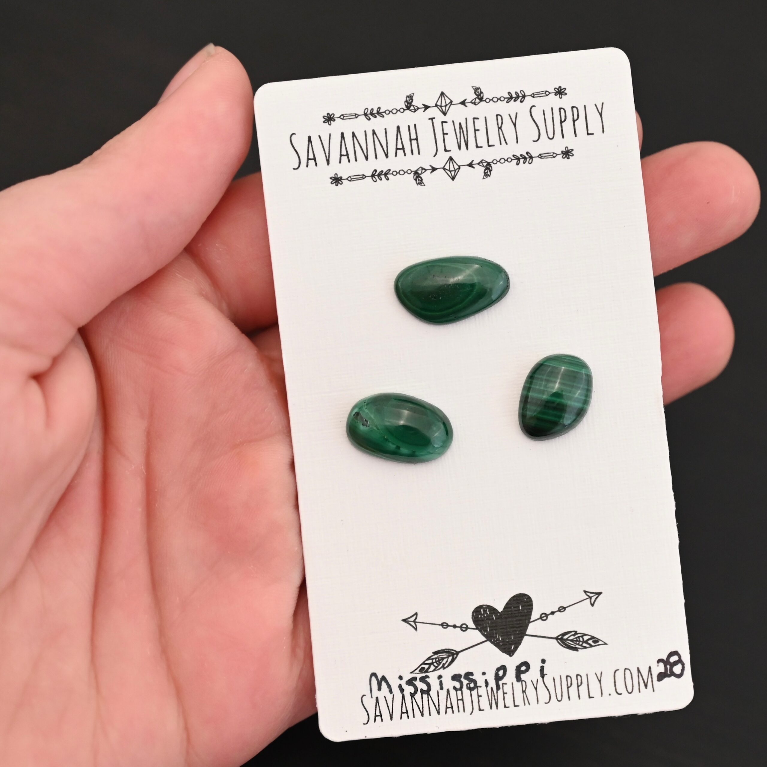 Mississippi Malachite Cabochon Parcel Mississippi Malachite Cabochon Parcel shown in hand