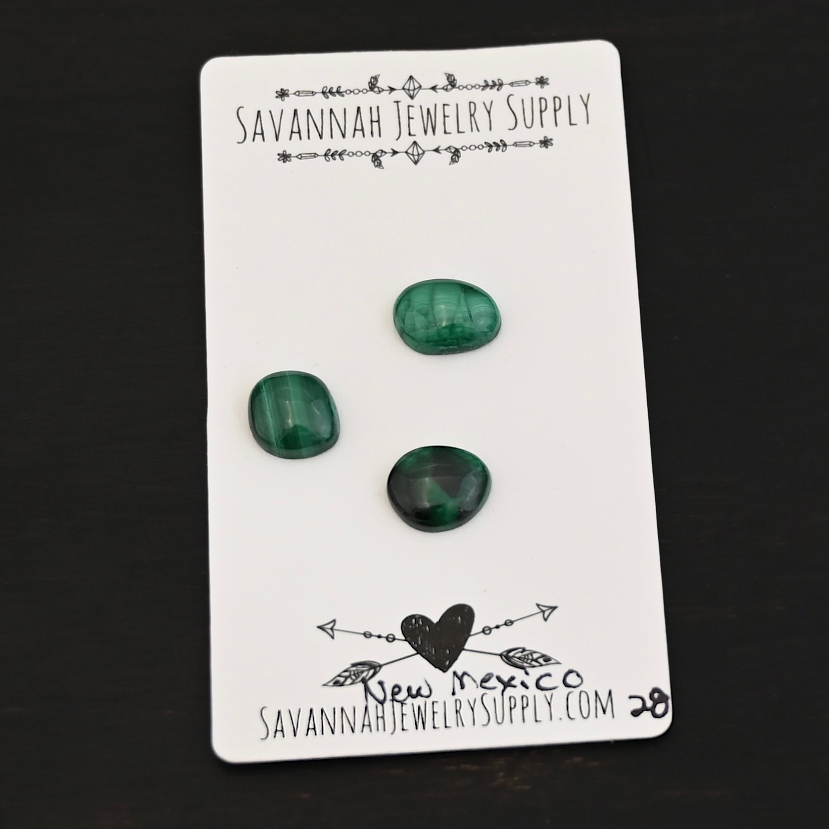 New Mexico Malachite Cabochon Parcel shown on business card