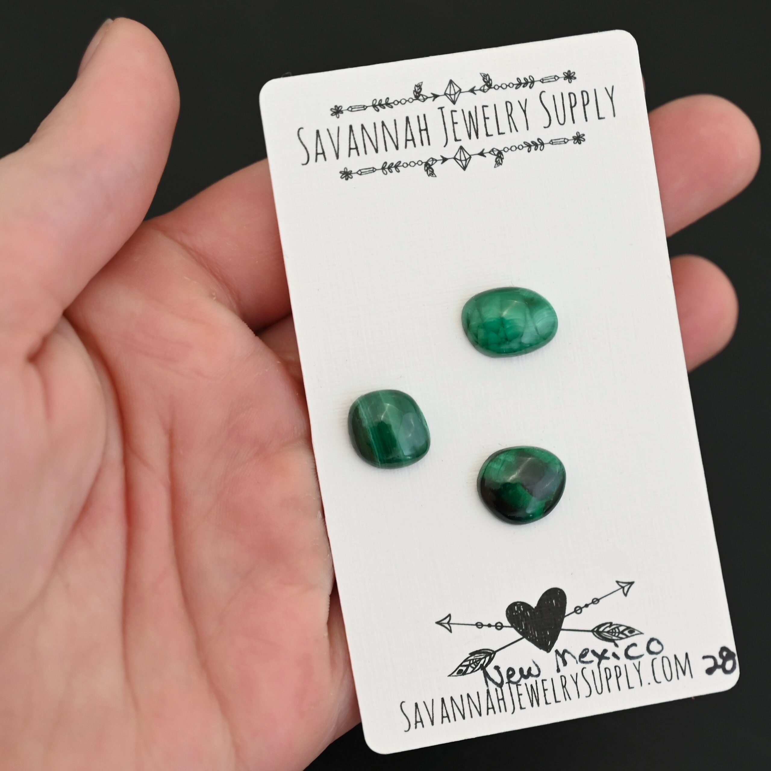 New Mexico Malachite Cabochon Parcel shown in hand