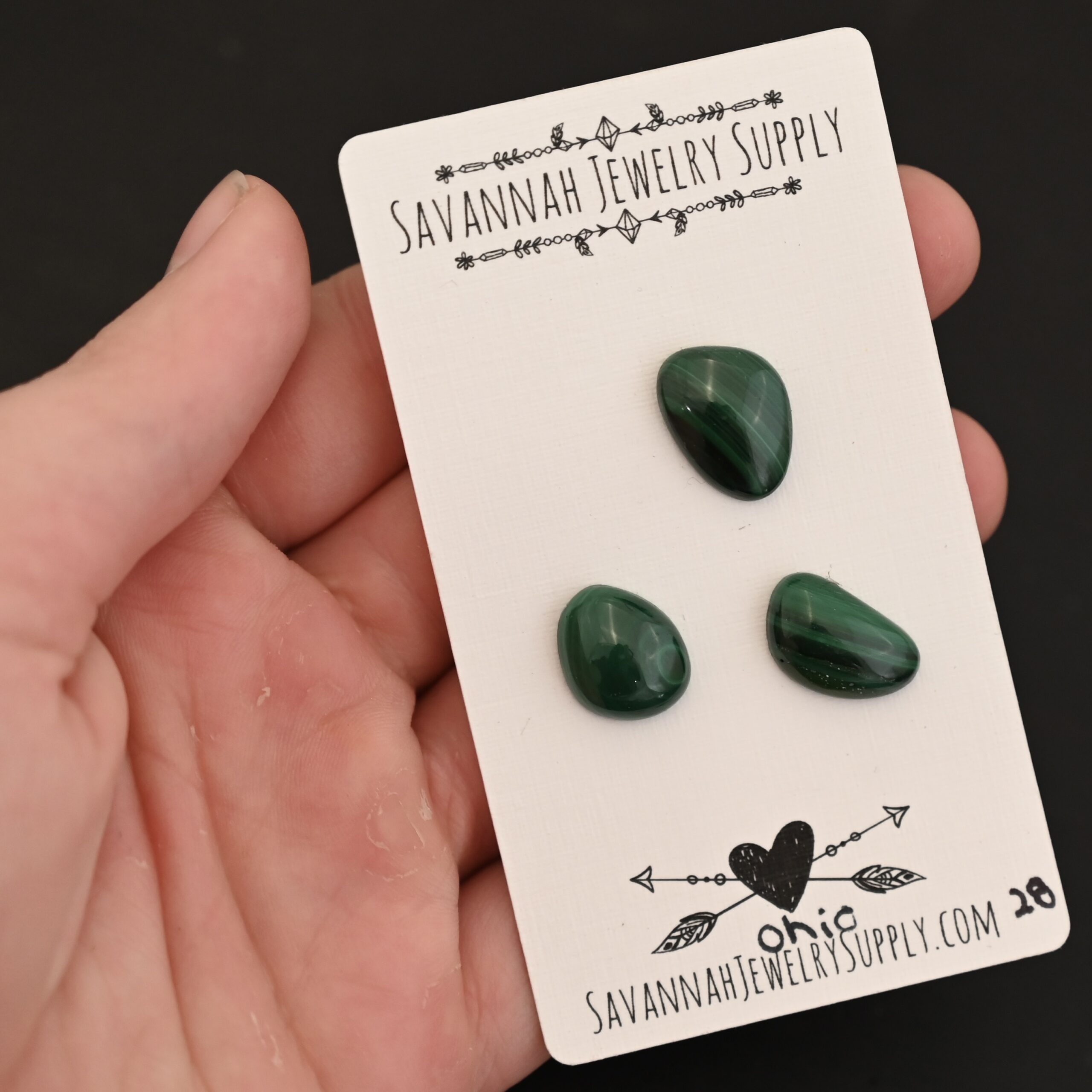 Ohio Malachite Cabochon Parcel shown in hand