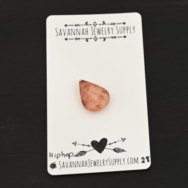 Hip Hop Lodalite Cabochon Parcel shown on business card