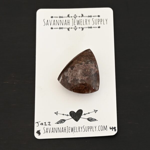 Jazz Lodalite Cabochon Parcel shown on business card