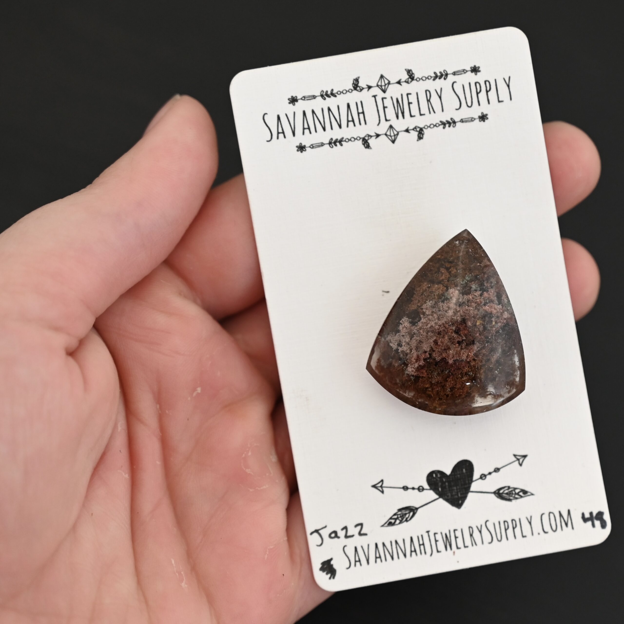 Jazz Lodalite Cabochon Parcel Jazz Lodalite Cabochon Parcel shown in hand