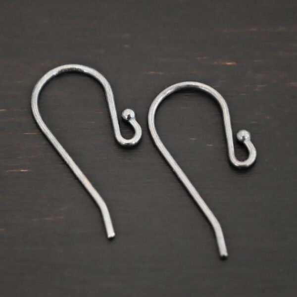 sterling silver Winnie Ear Wires - oxidized shown on dark background