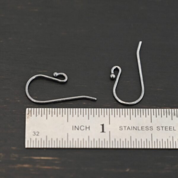 sterling silver Winnie Ear Wires - oxidized shown by ruler