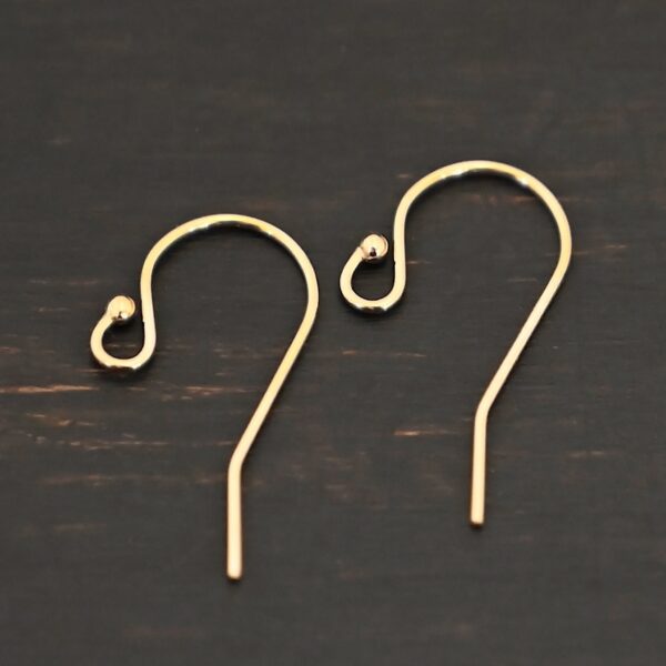 14k Gold Filled Wilma Ear Wires shown on dark background