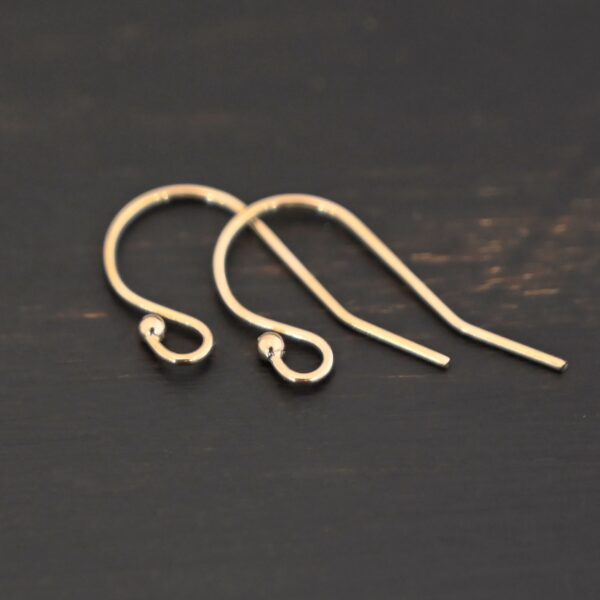 14k Gold Filled Wilma Ear Wires shown on dark background