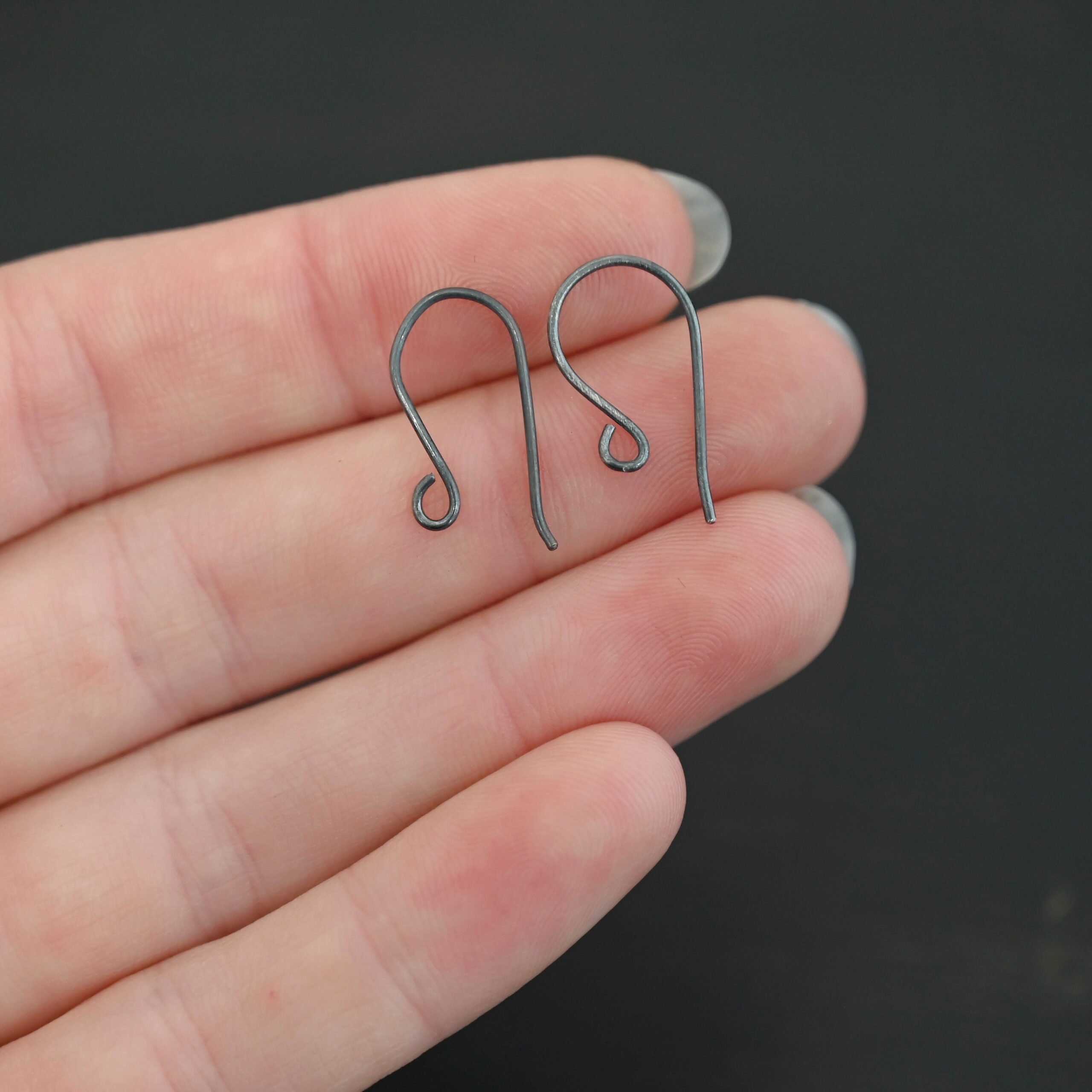Sterling Silver Wanda Ear Wires - oxidized shown in hand