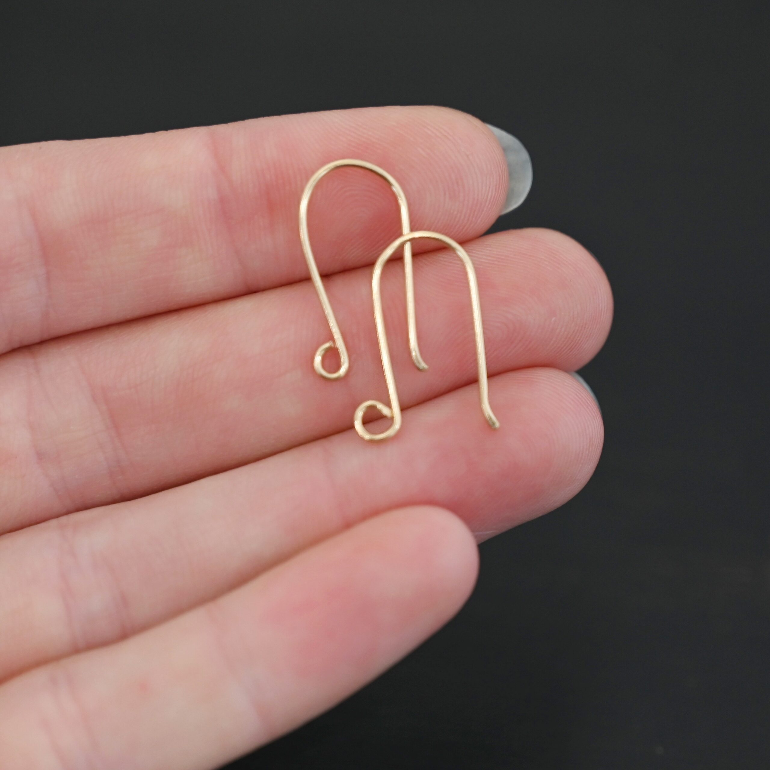 14k Gold Filled Wanda Ear Wires - shown in hand
