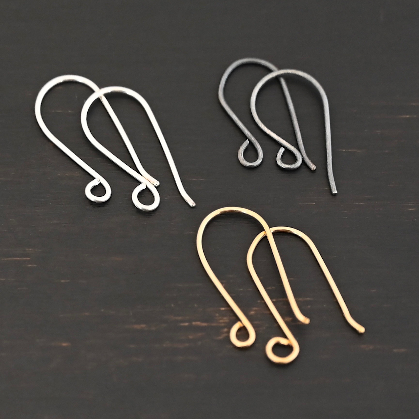 Wanda Ear Wires - shiny silver, oxidized silver, and gold filled shown on dark background