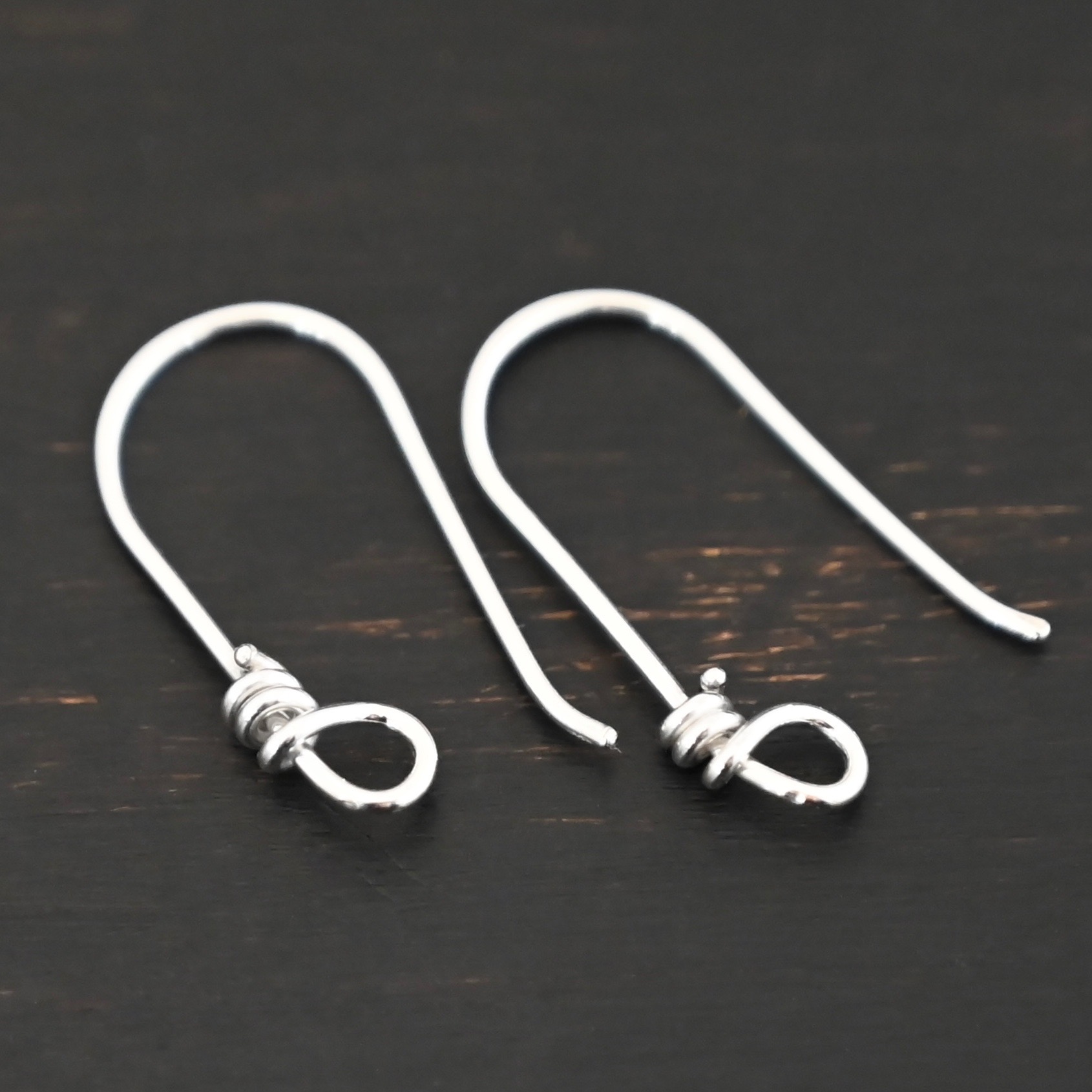 sterling silver Wendolyn Ear Wires - shiny shown on dark background