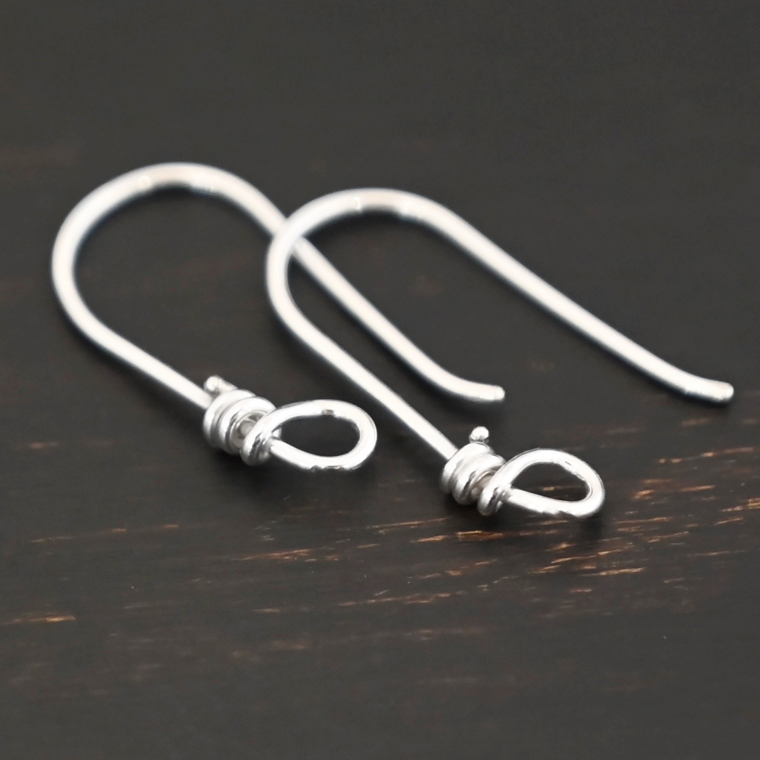 sterling silver Wendolyn Ear Wires - shiny shown on dark background