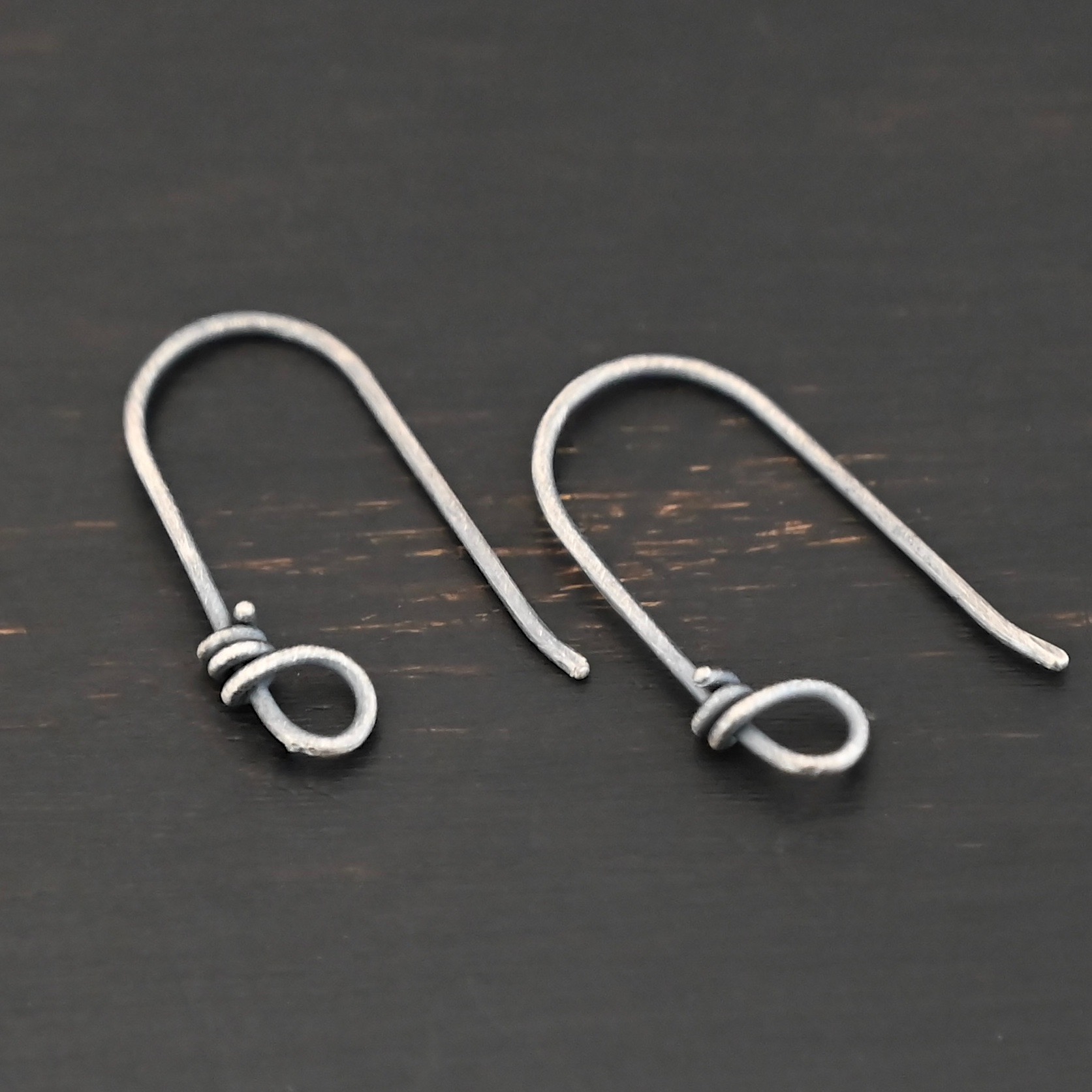 sterling silver Wendolyn Ear Wires - oxidized shown by ruler