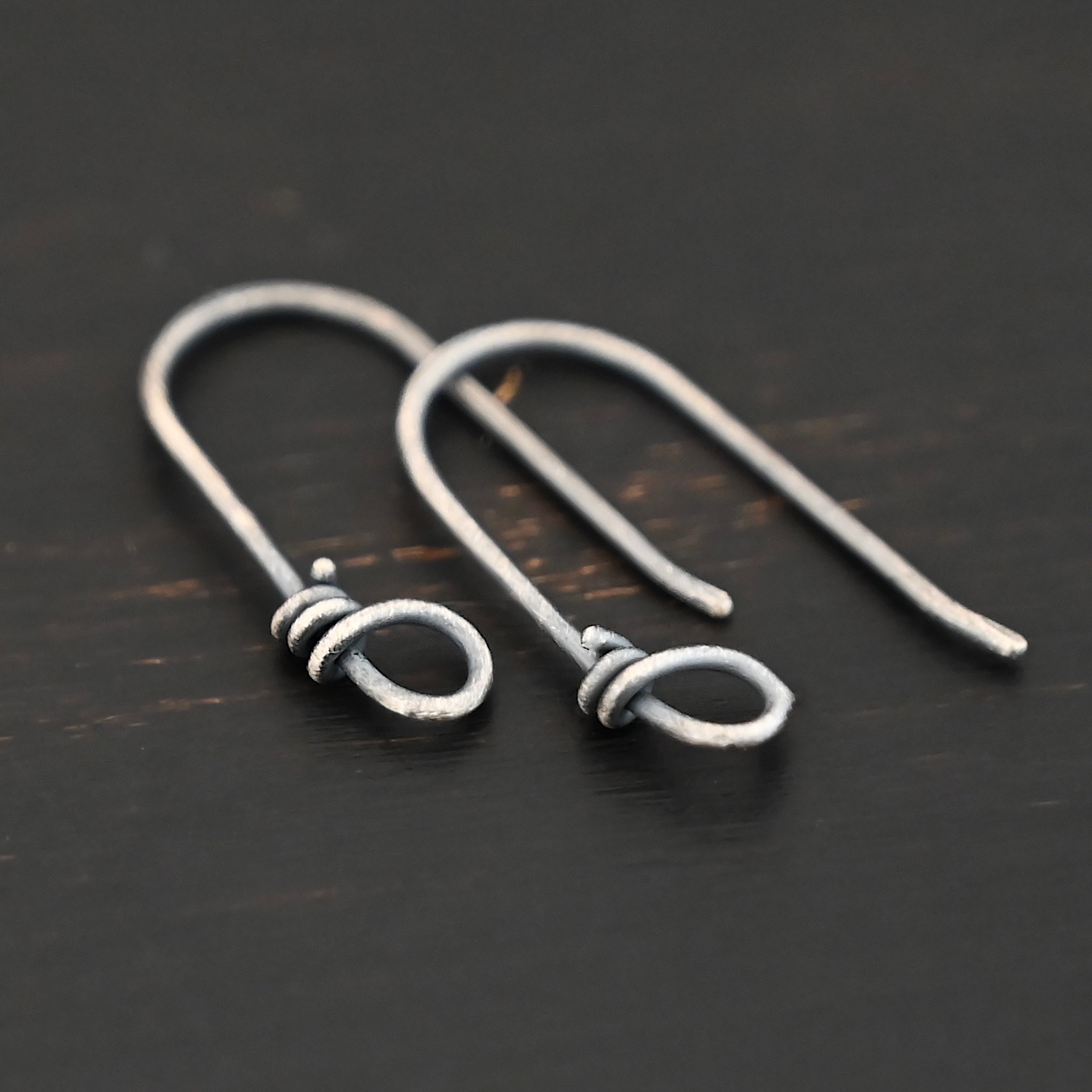 sterling silver Wendolyn Ear Wires - oxidized shown by ruler