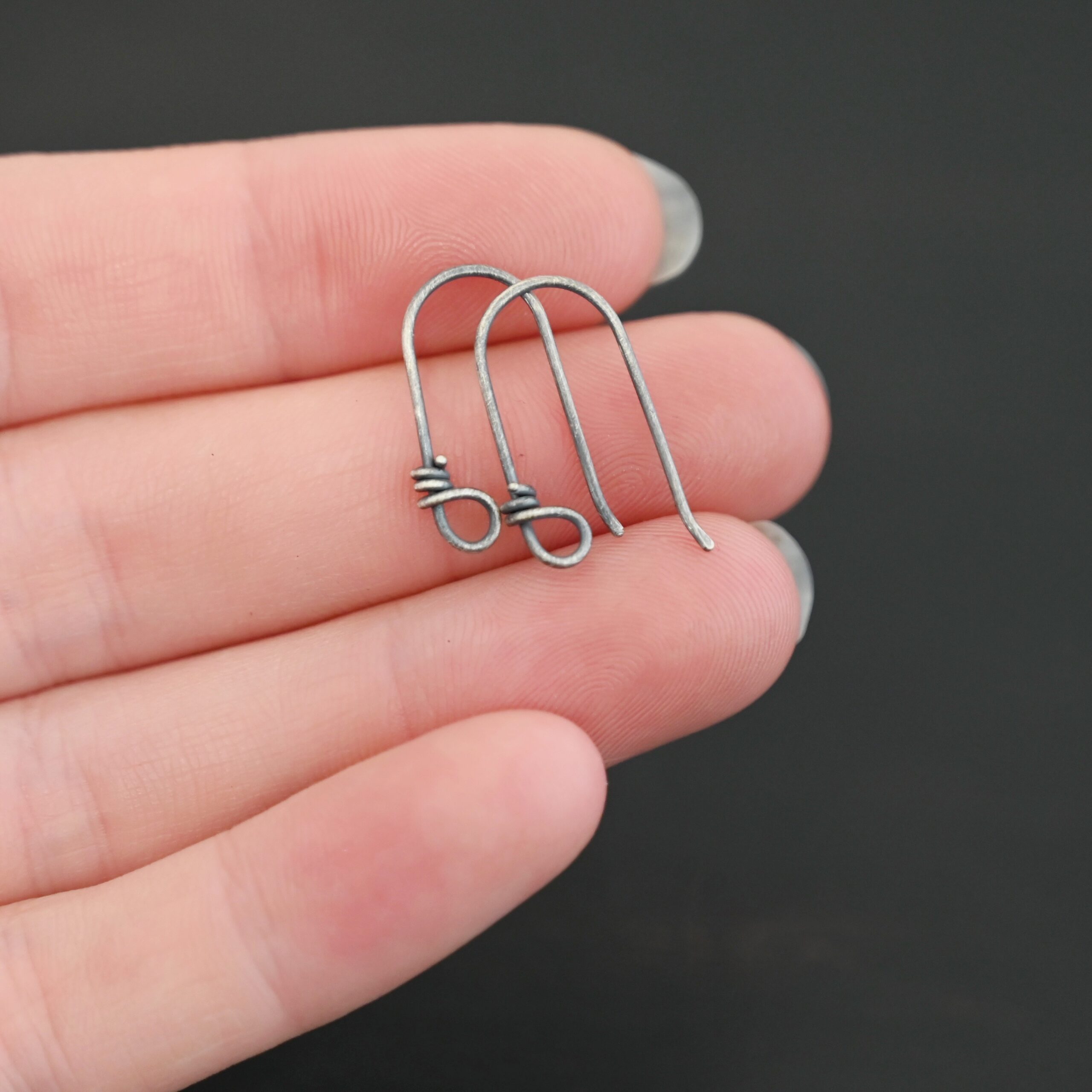 sterling silver Wendolyn Ear Wires - oxidized shown in hand