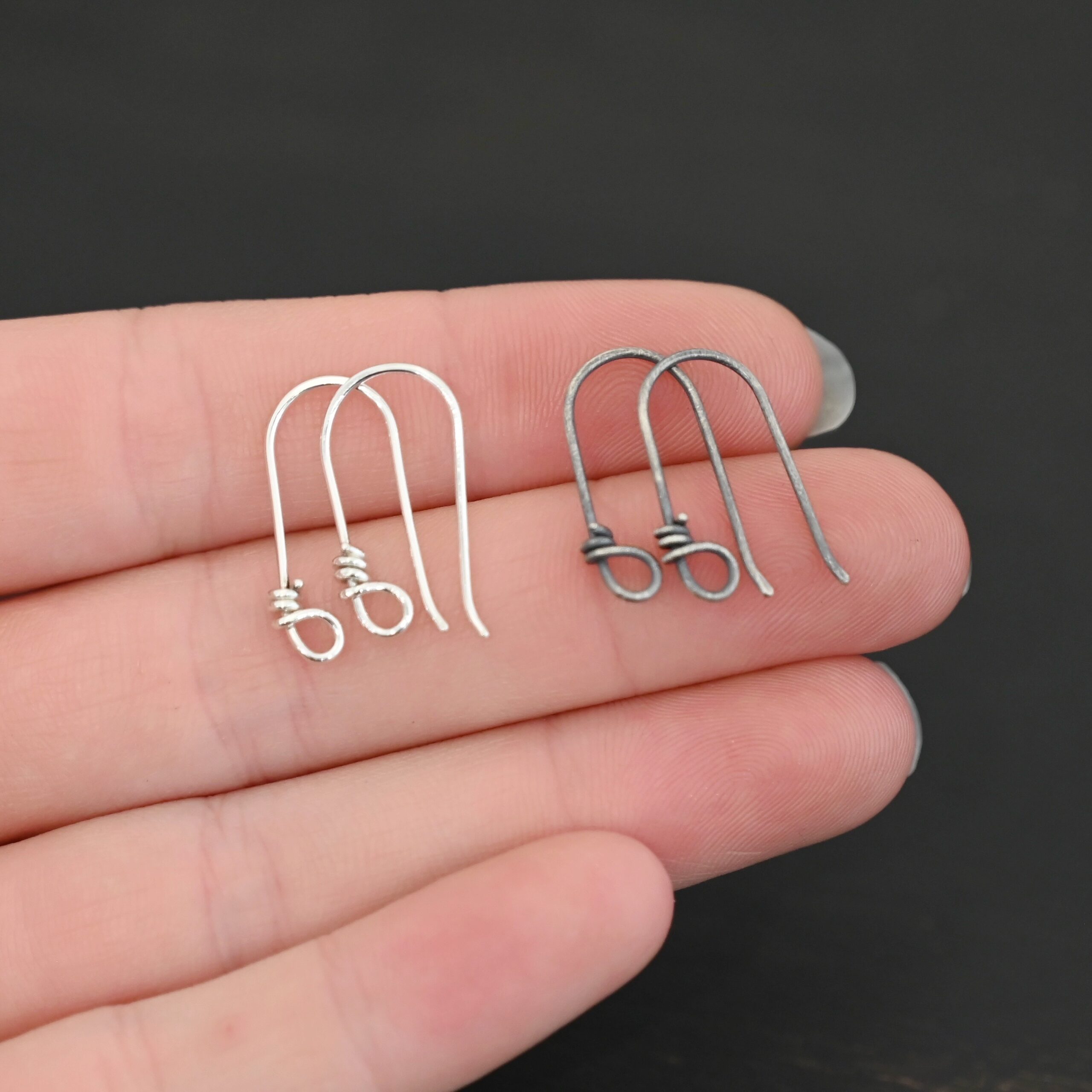 sterling silver Wendolyn Ear Wires - oxidized & shiny shown in hand