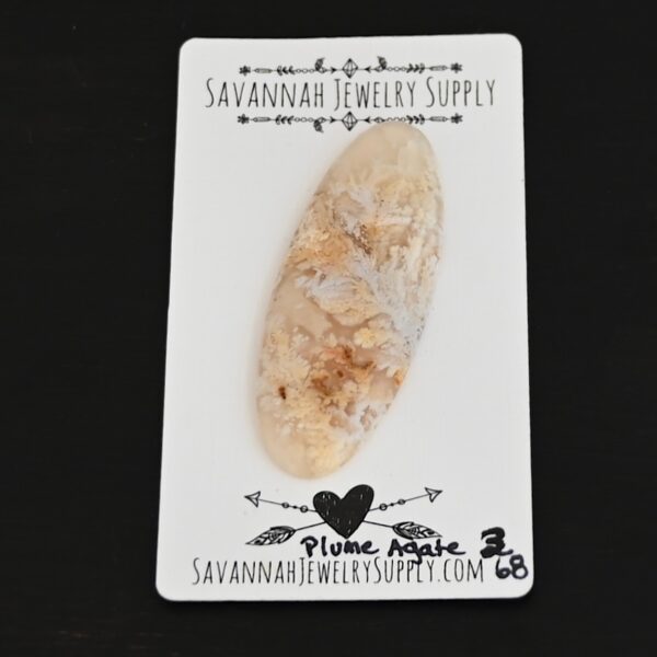 Plume Agate #3 Cabochon shown on business card