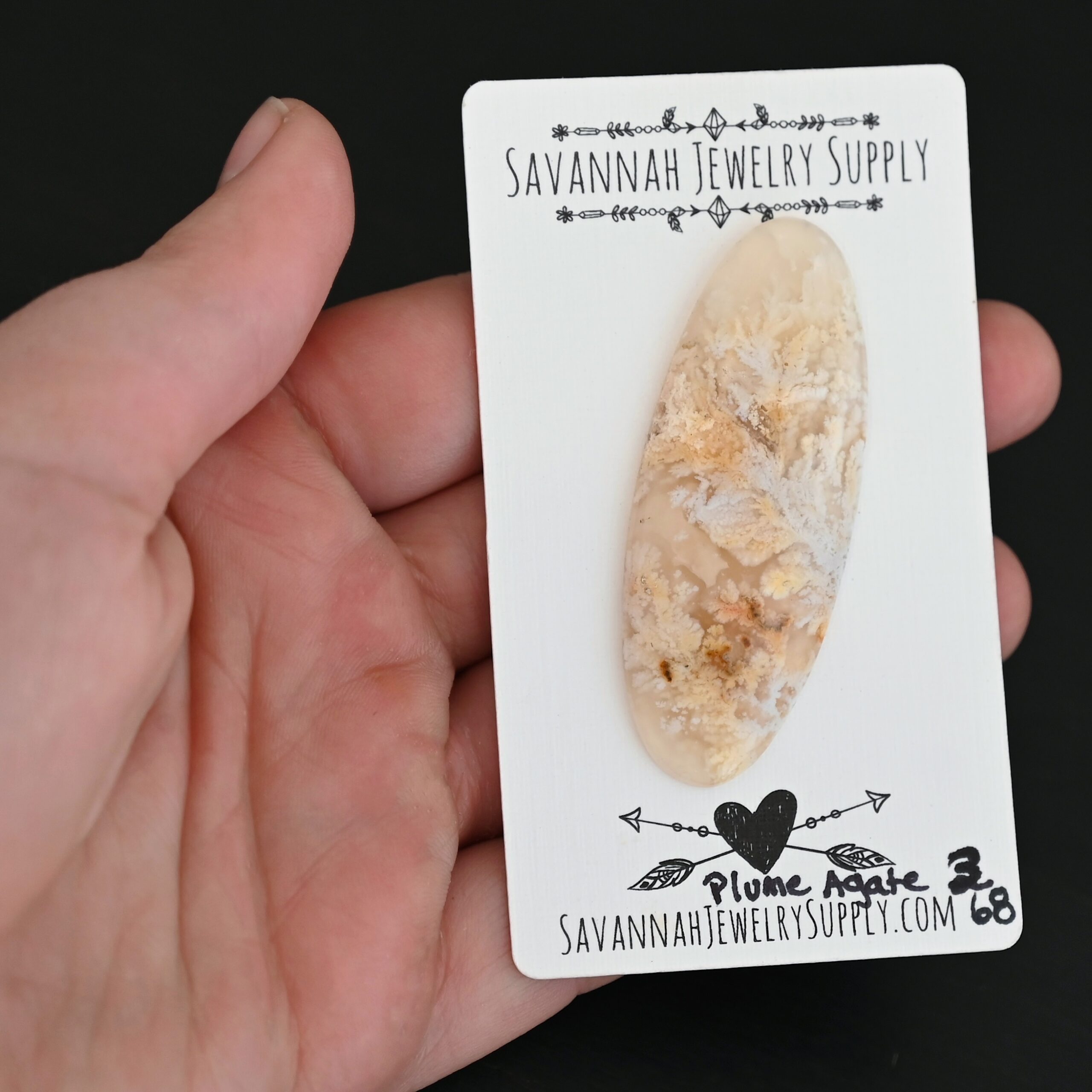 Plume Agate #3 Cabochon Plume Agate #3 Cabochon shown in hand