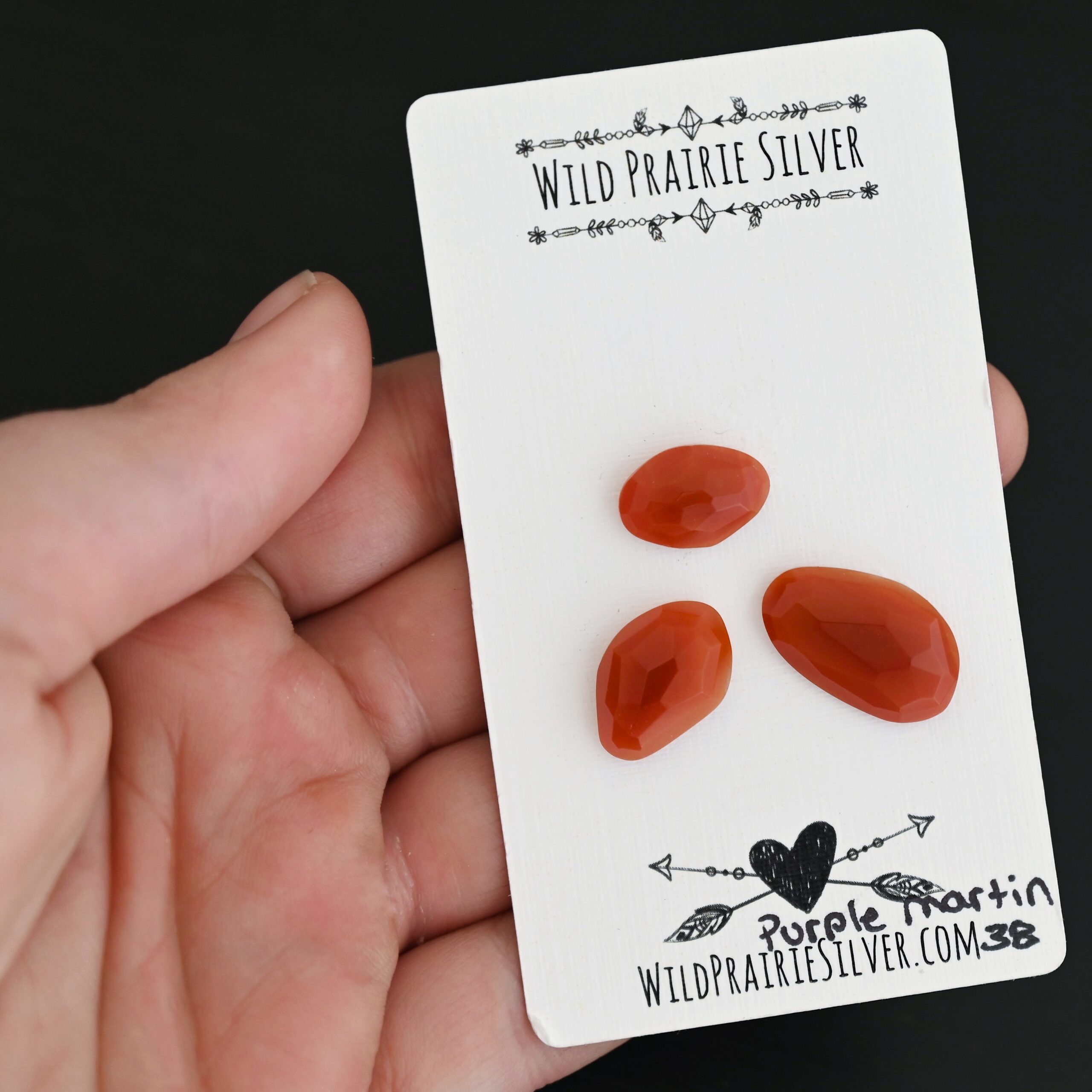 Purple Martin Rose Cut Carnelian Cabochon Parcel Purple Martin Rose Cut Carnelian Cabochon Parcel shown in hand