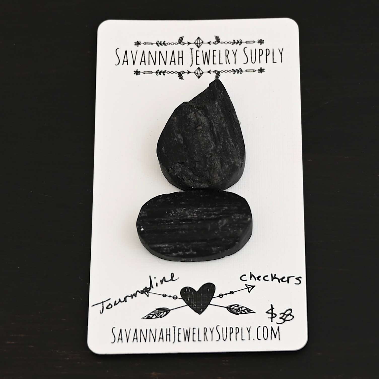 Checkers Tourmaline Cabochon Parcel shown on business card