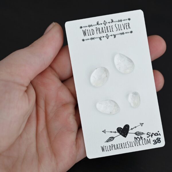 Mt. Sinai Rose Cut Blue Moon Quartz Cabochon Parcel shown in hand
