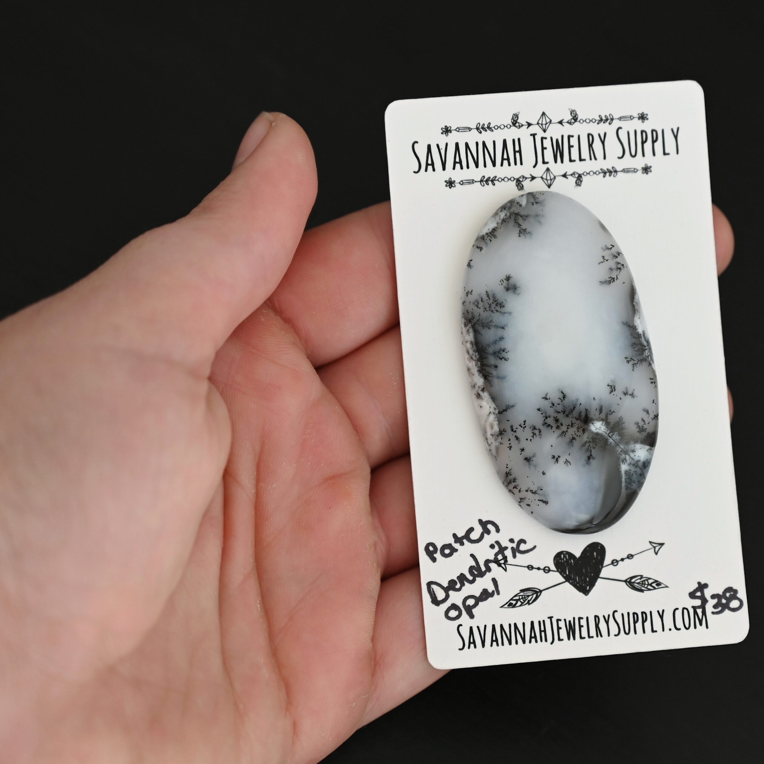 Patch Dendritic Opal Cabochon shown in hand