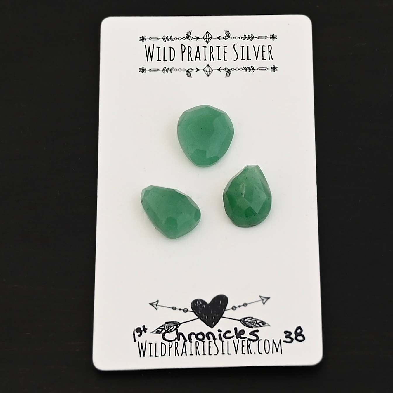 1st Chronicles Adventurine Cabochon Parcel shown on business card