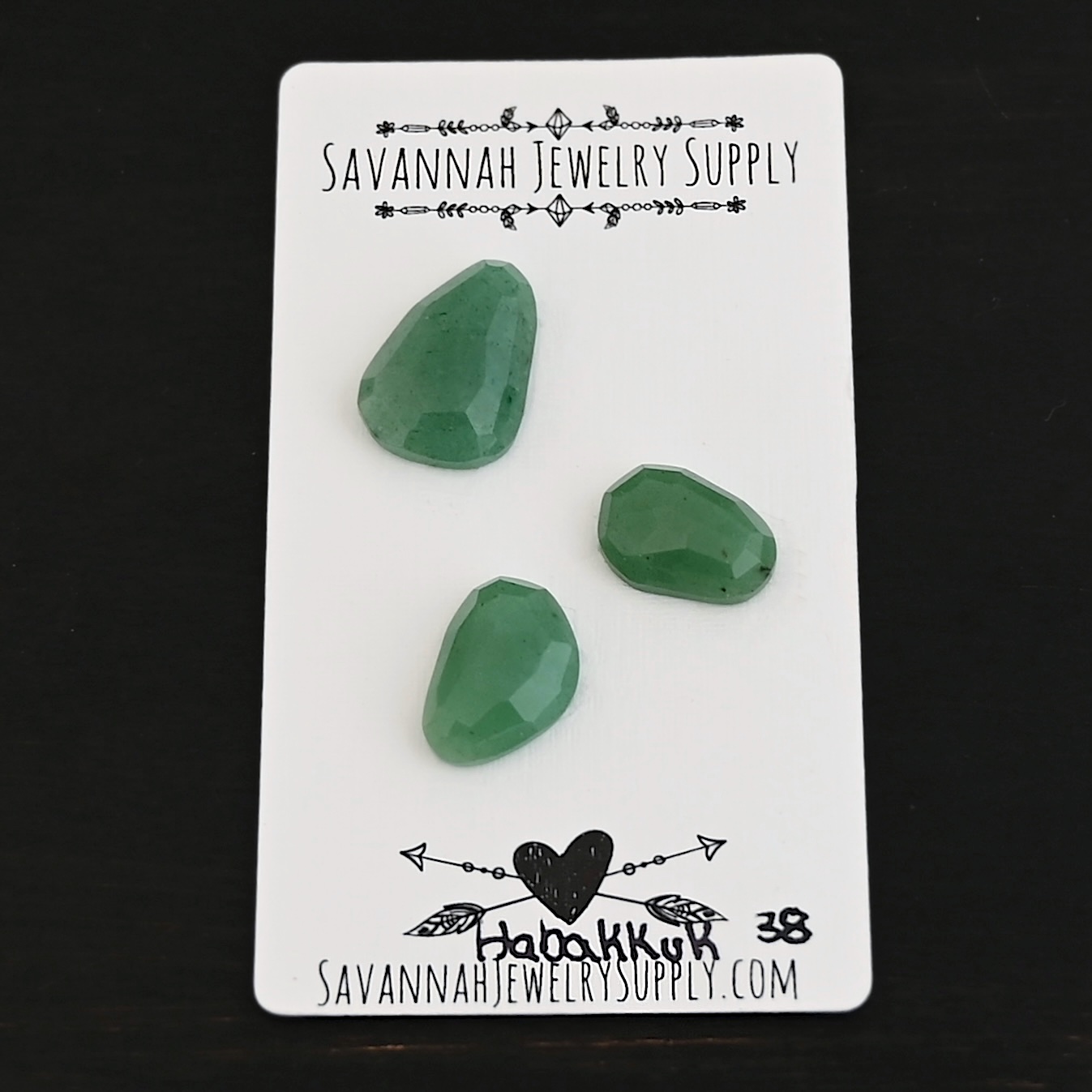 Habakkuk Adventurine Cabochon Parcel shown on business card