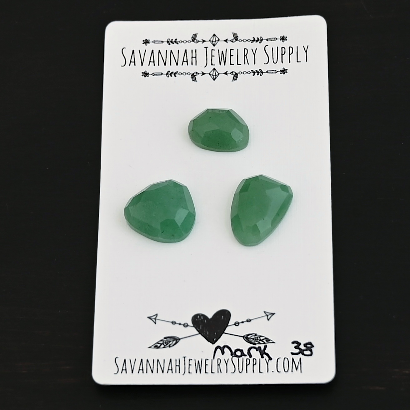 Mark Adventurine Cabochon Parcel shown on business card