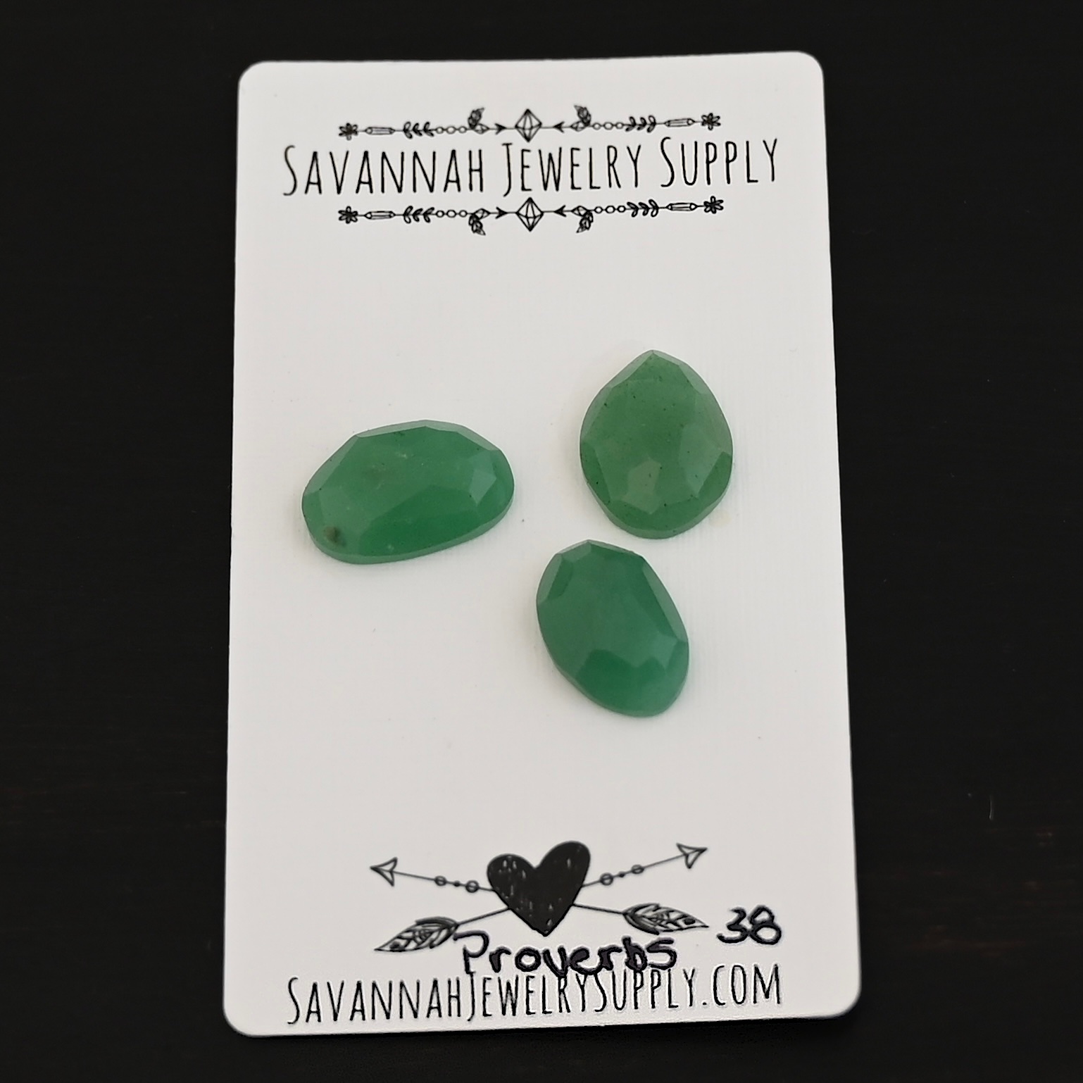 Proverbs Adventurine Cabochon Parcel shown on business card