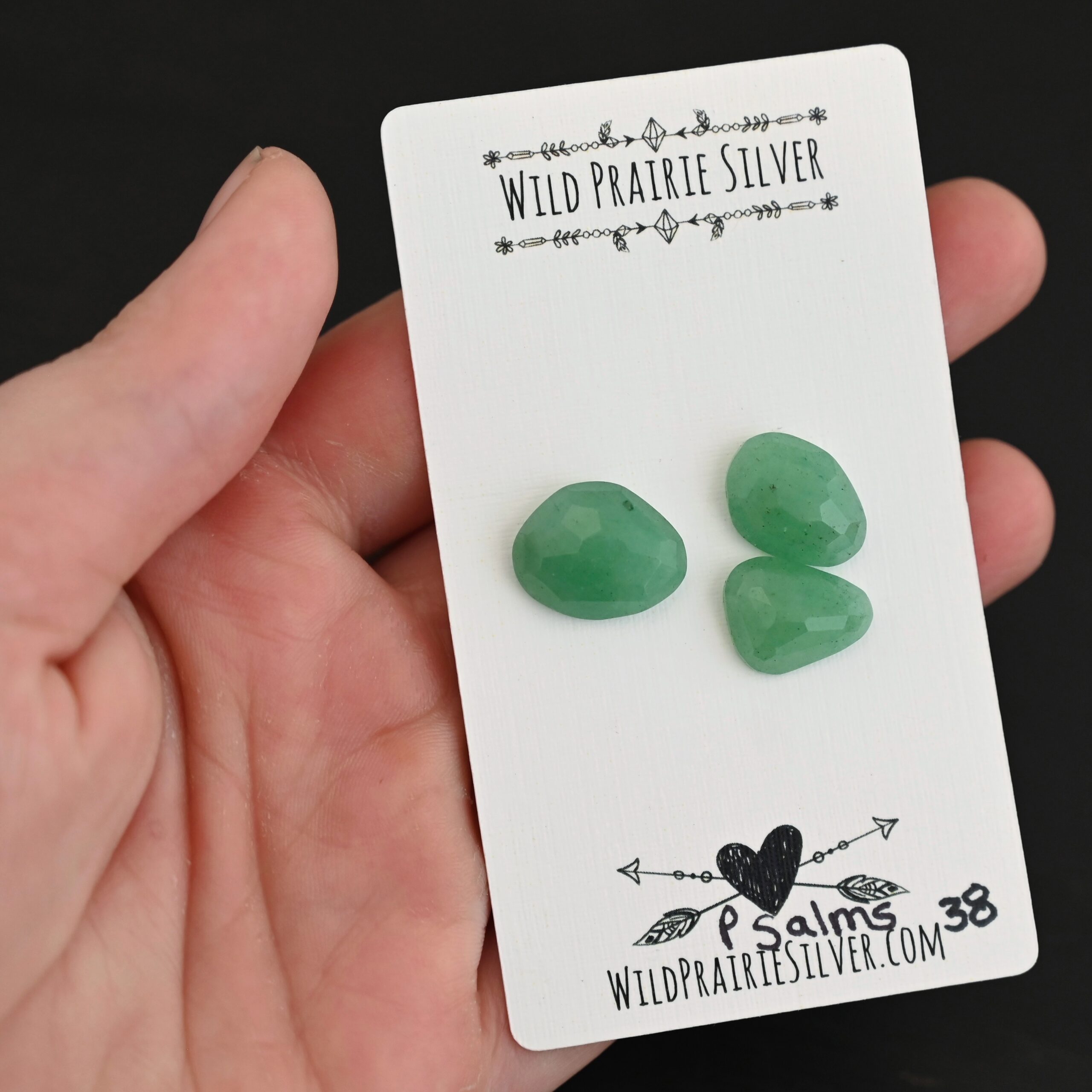 Psalms Adventurine Cabochon Parcel shown in hand