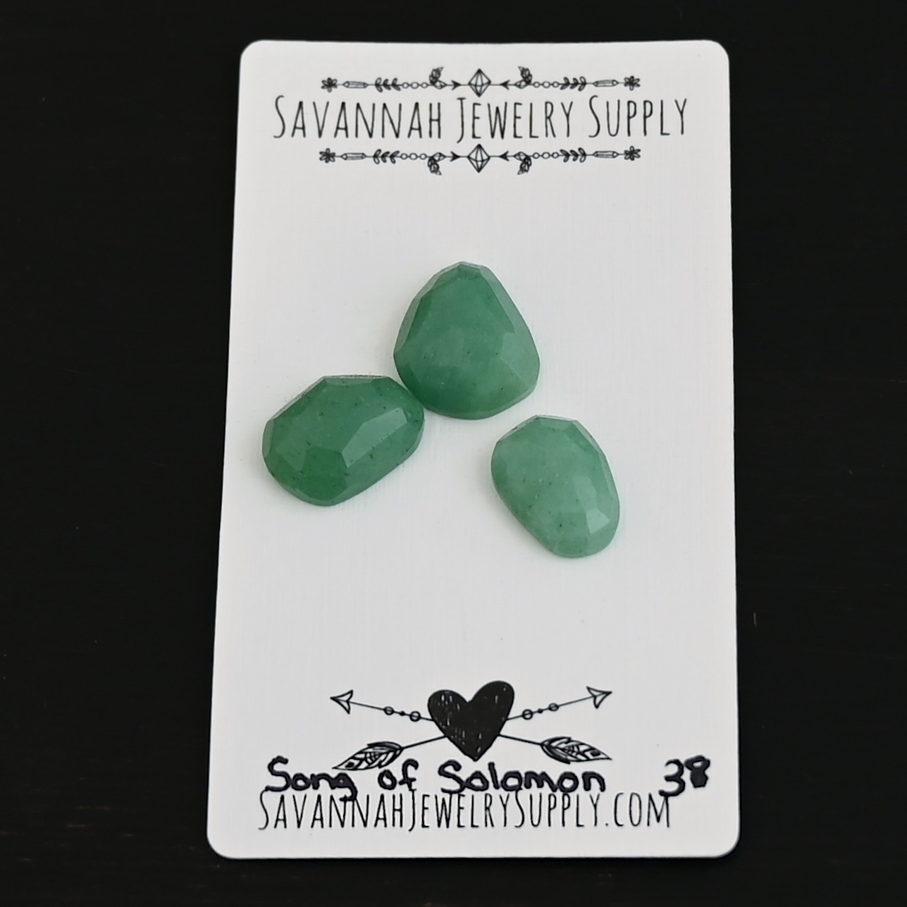 Song of Solomon Adventurine Cabochon Parcel shown on business card