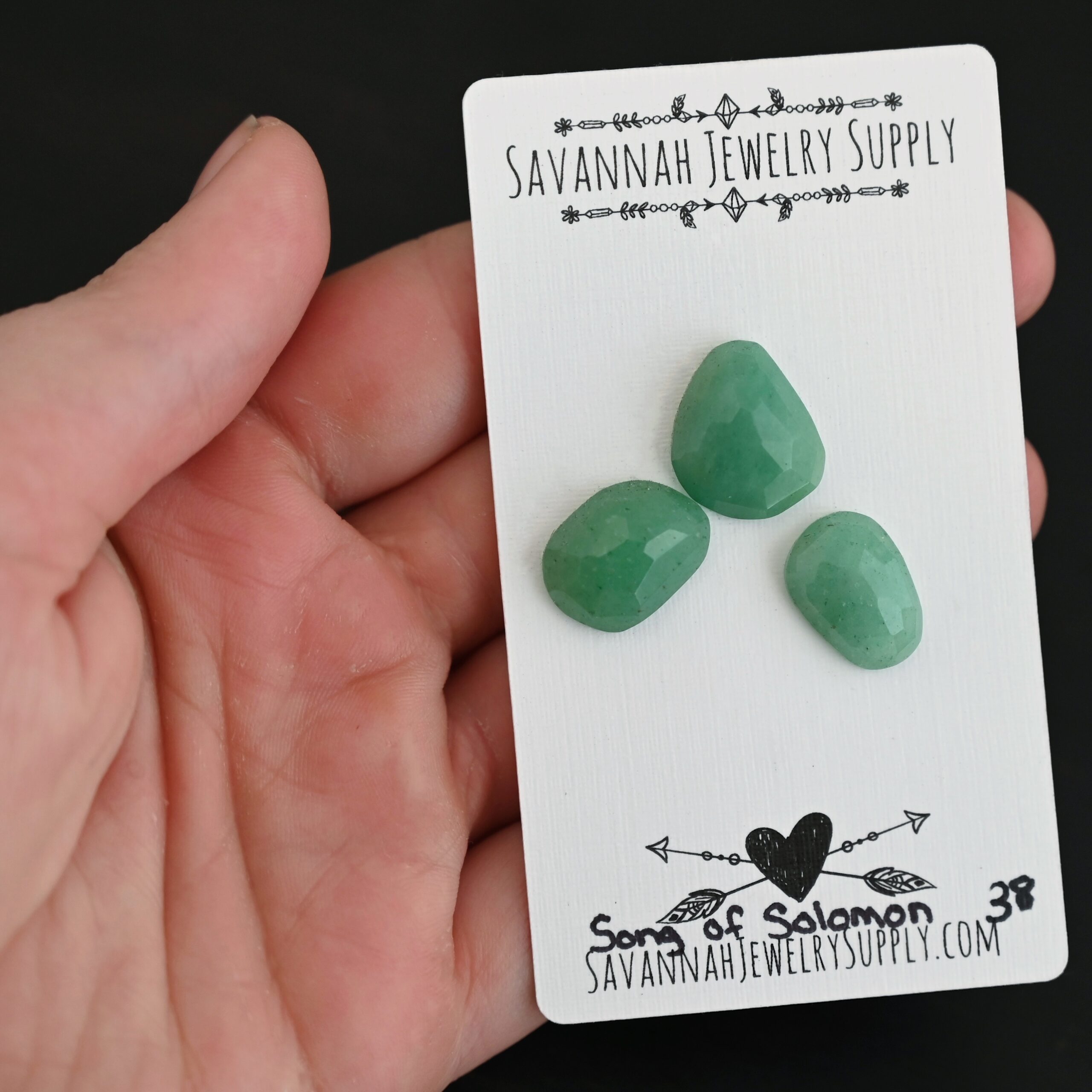Song of Solomon Adventurine Cabochon Parcel shown in hand