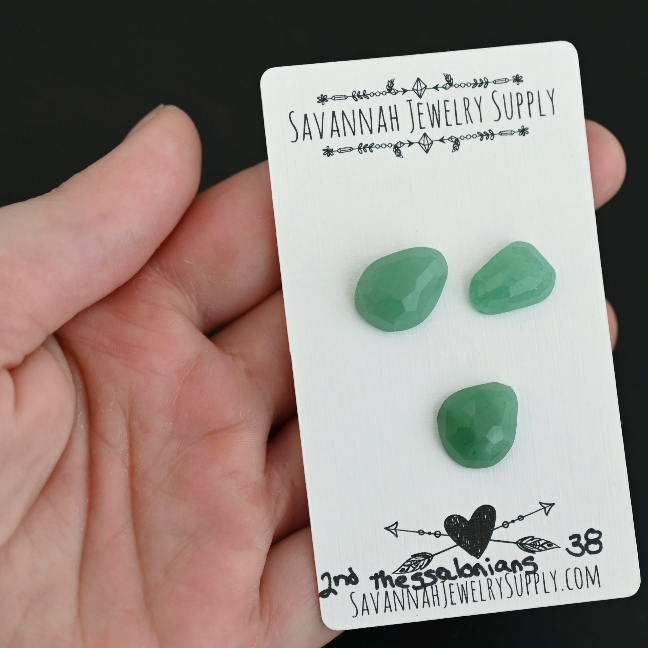 2nd Thessalonians Adventurine Cabochon Parcel shown in hand