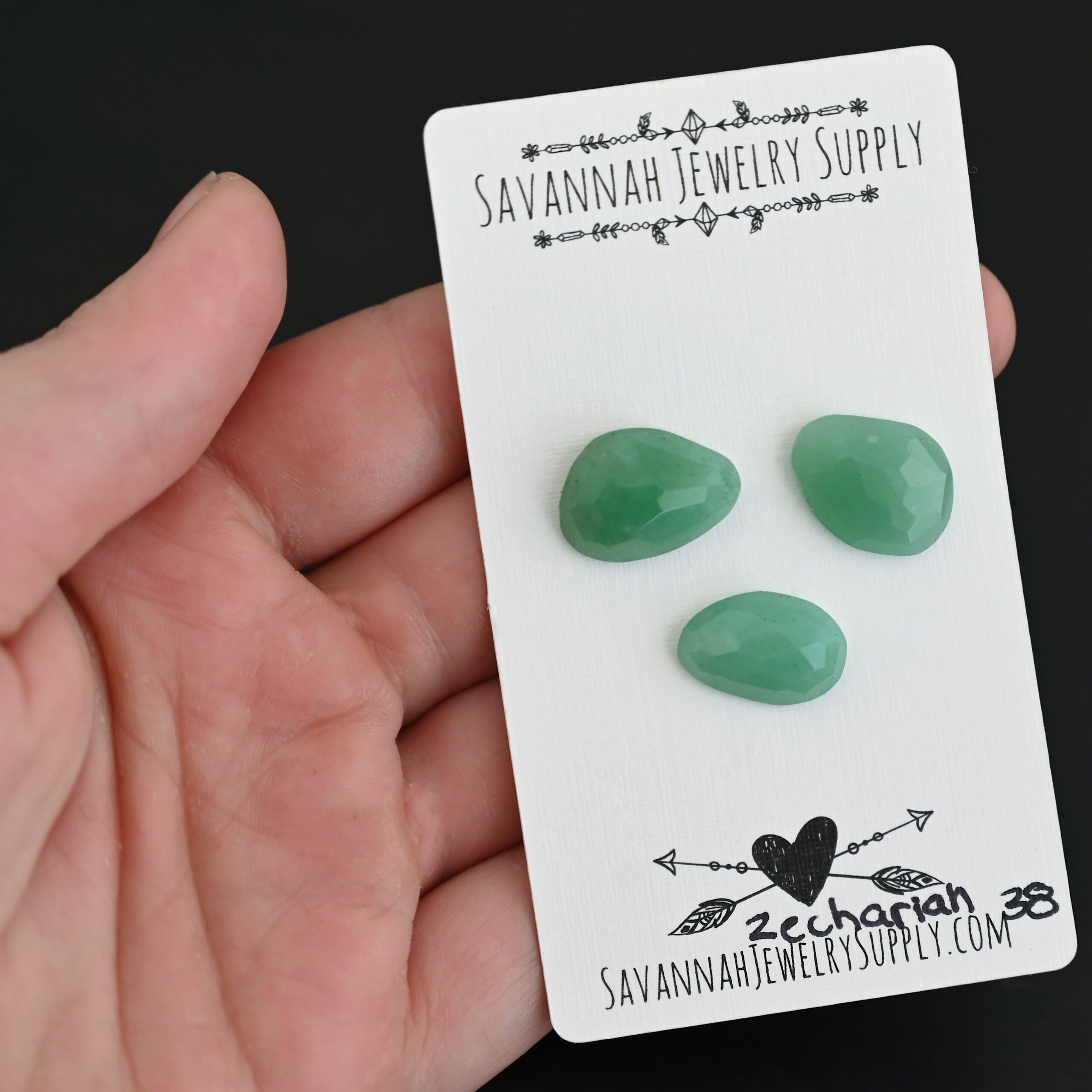 Zechariah Adventurine Cabochon Parcel shown in hand