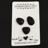 Aladdin Black Onyx Cabochon Parcel shown on business card