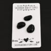 Buzz Black Onyx Cabochon Parcel shown on business card