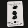 Daffy Duck Black Onyx Cabochon Parcel shown on business card
