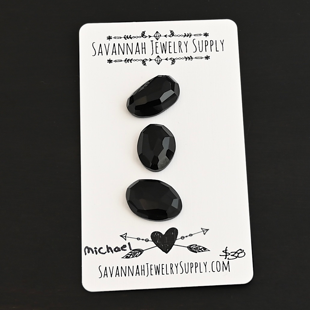 Michael Black Onyx Cabochon Parcel Michael Black Onyx Cabochon Parcel shown on business card