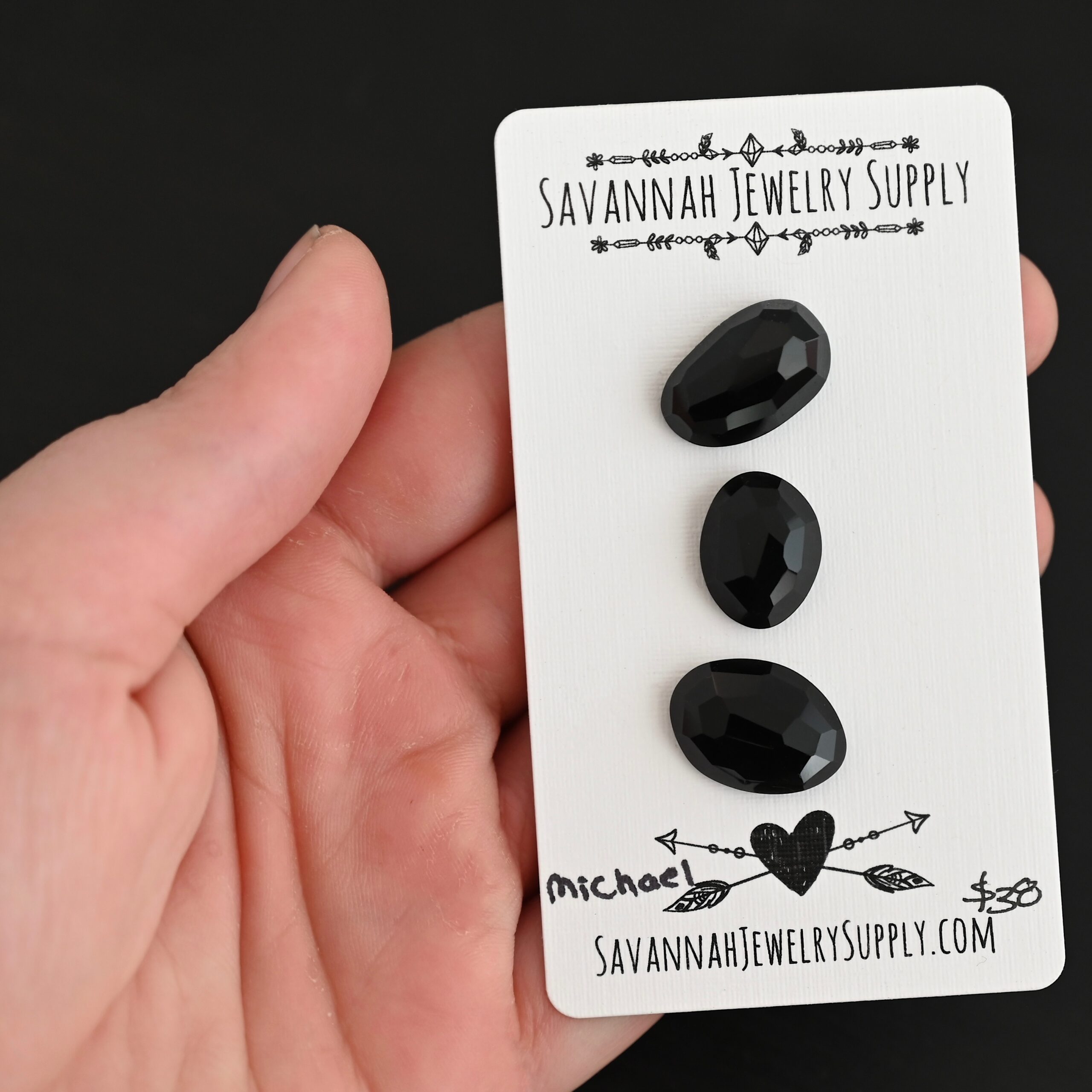 Michael Black Onyx Cabochon Parcel Michael Black Onyx Cabochon Parcel shown in hand