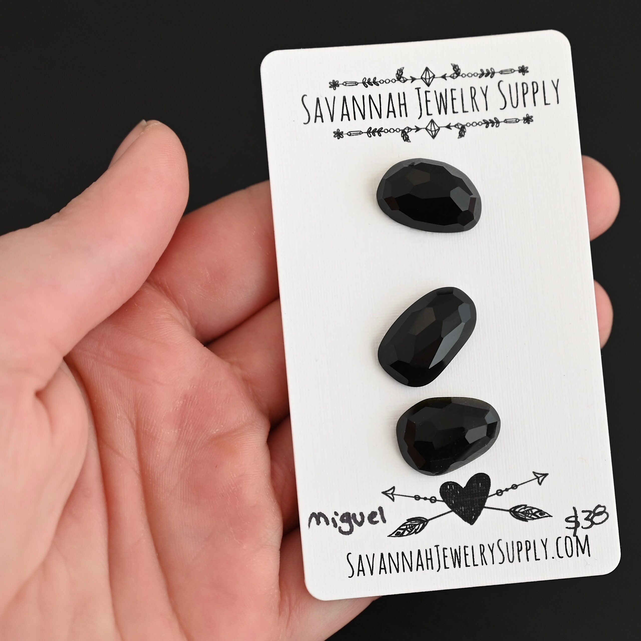 Miguel Black Onyx Cabochon Parcel shown in hand