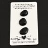 Naveen Black Onyx Cabochon Parcel shown on business card