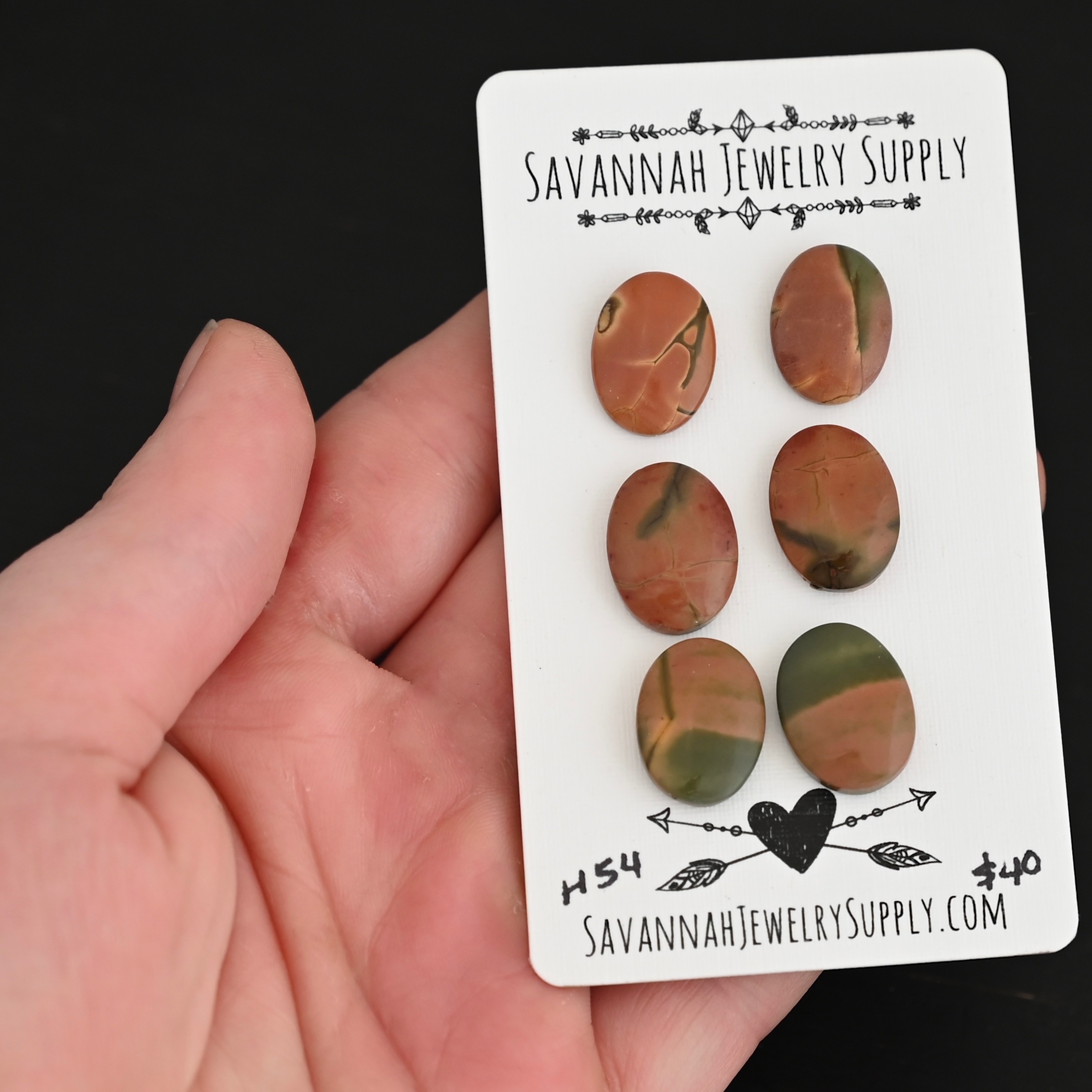 H54 Cherry Creek Jasper shown in hand