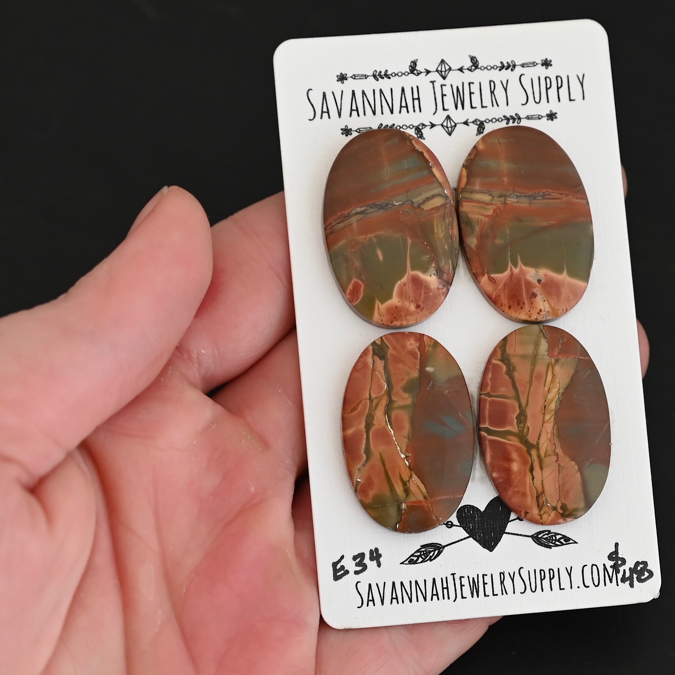 E34 Cherry Creek Jasper shown in hand