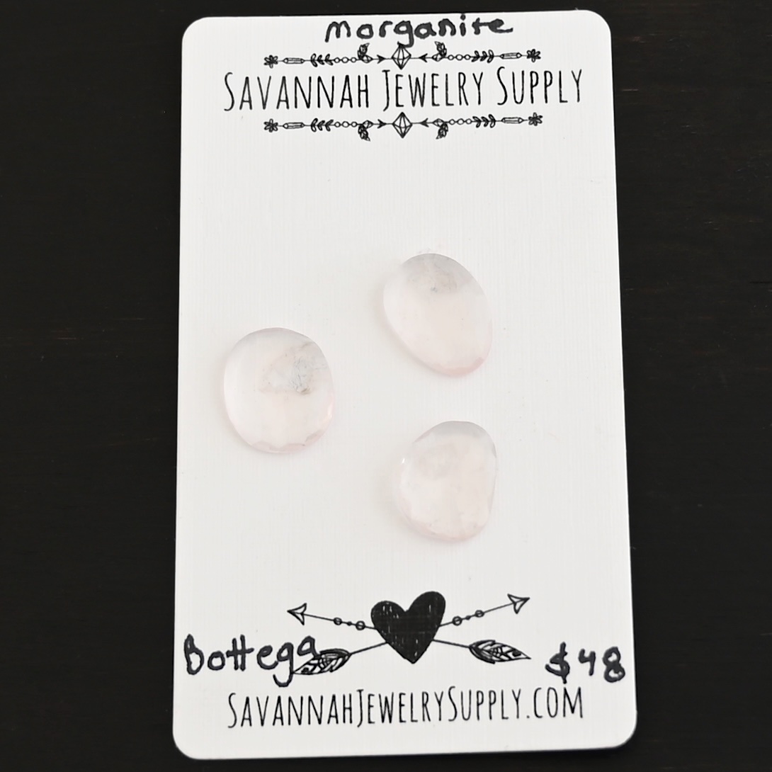 Bottega Rose Cut Morganite Cabochon Parcel shown on business card