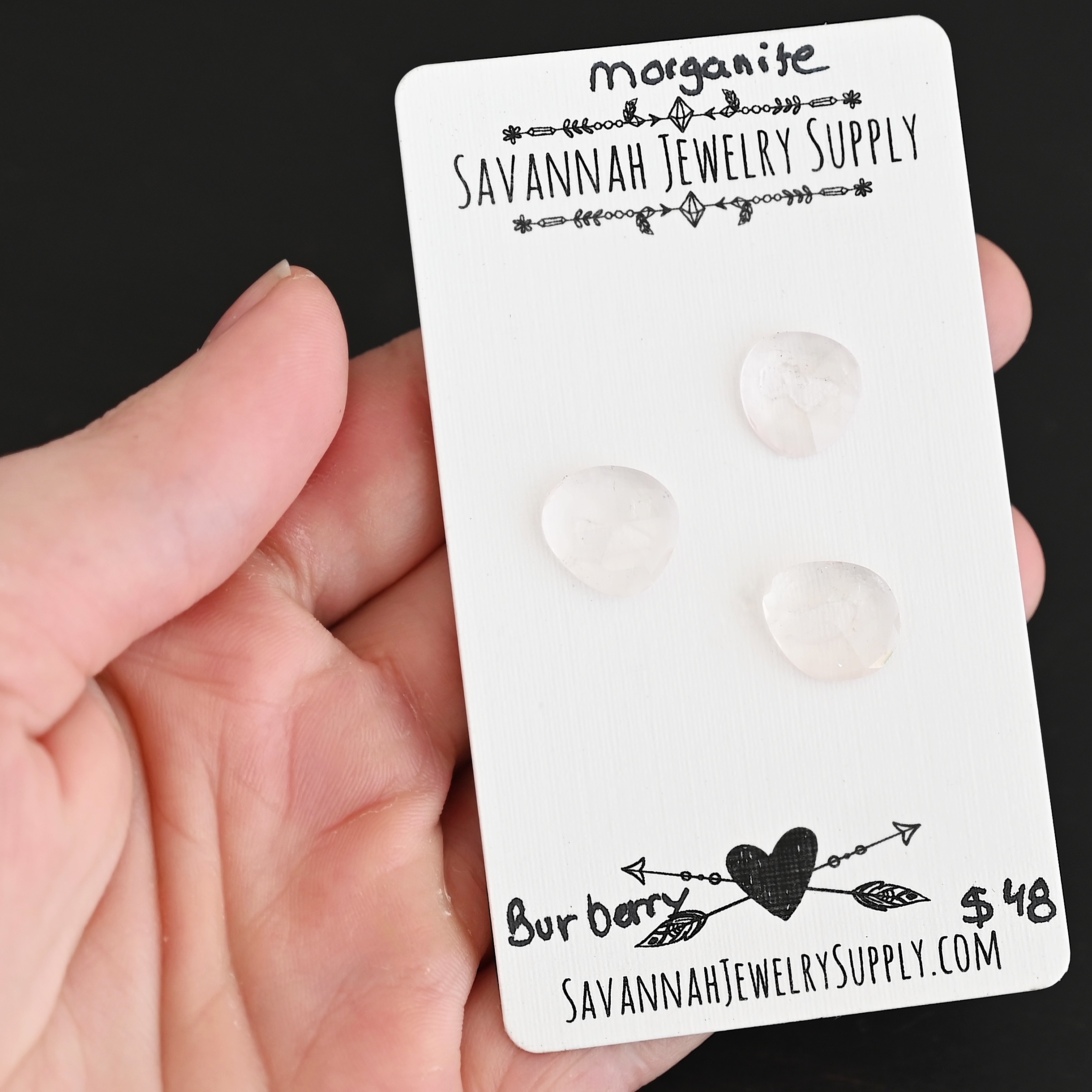 Burberry Rose Cut Morganite Cabochon Parcel shown in hand