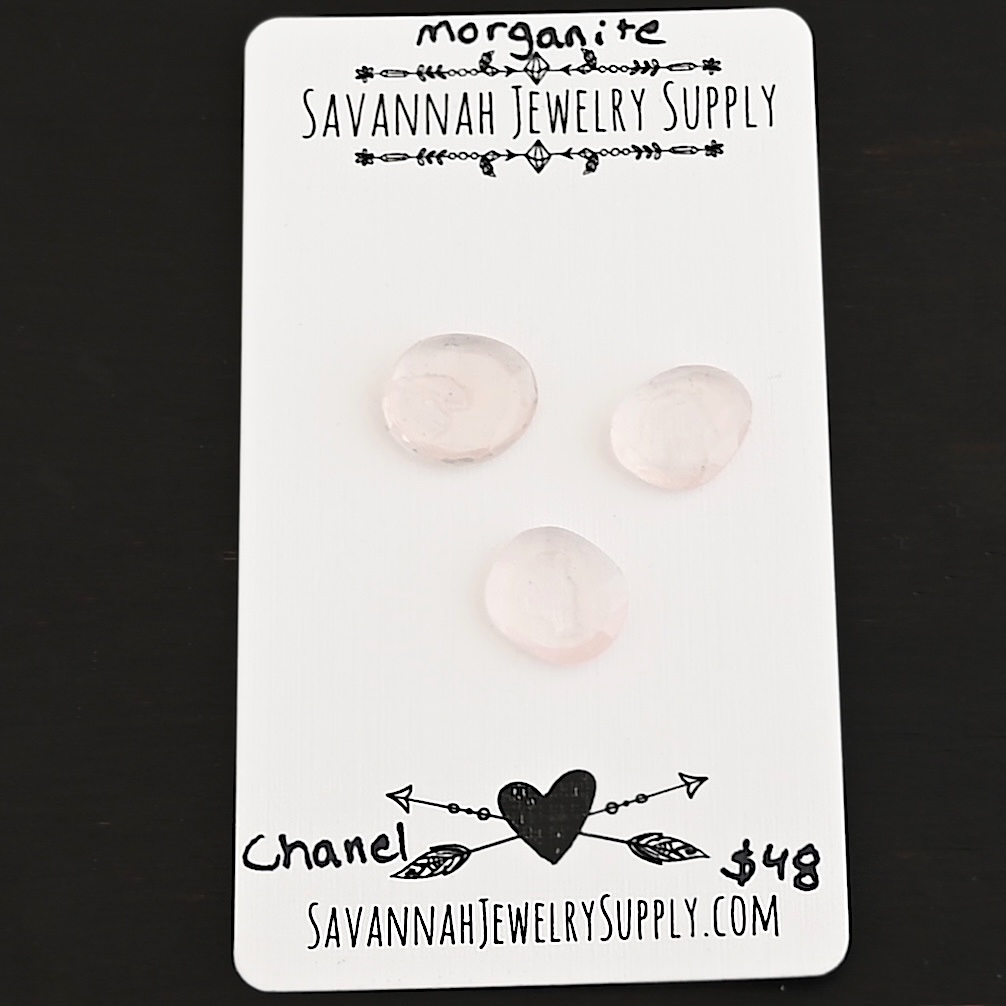 Chanel Rose Cut Morganite Cabochon Parcel shown on business card